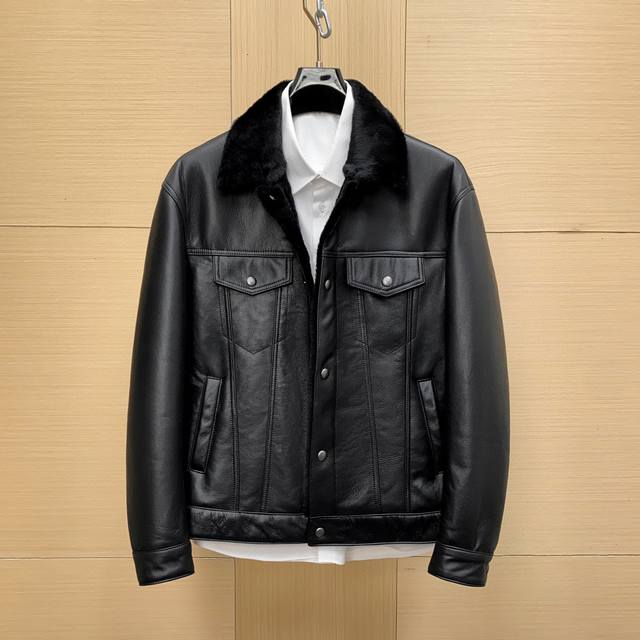 In Stock! This Prada men's shearling jacket with a turn-down collar is made of
