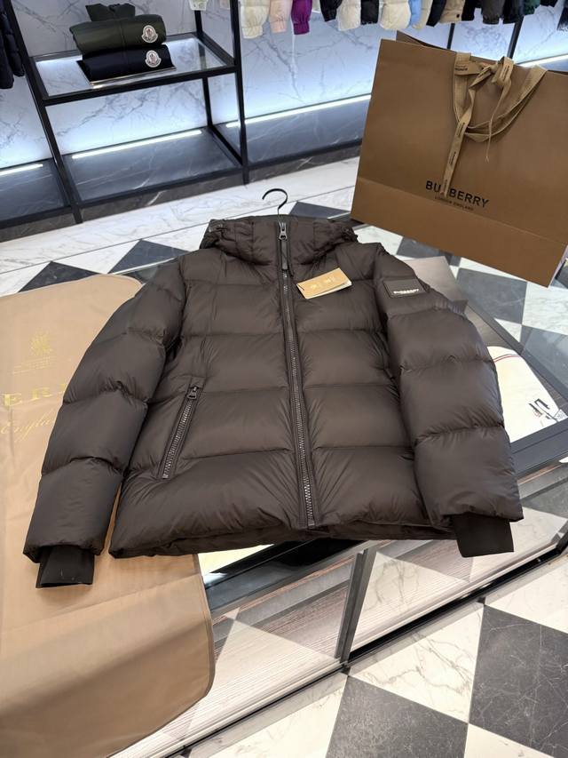 Burberry color-blocked down jacket with logo and lettering, featuring a detachab