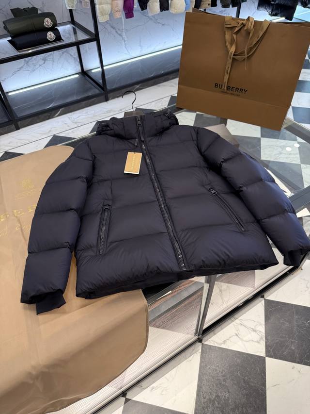Burberry color-blocked down jacket with detachable hood and logo. More detailed