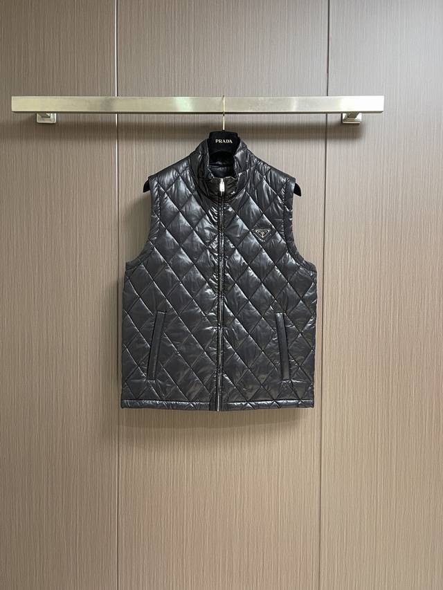 Prada quilted down sleeveless vest, classic diamond quilting, simple yet sophis