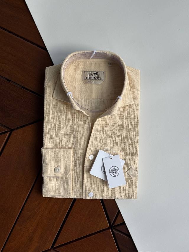 A pale yellow detail from a Hermes collection, this high-quality, high-count ja