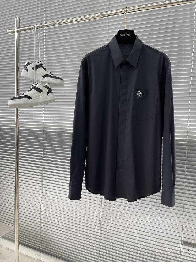 Autumn/Winter - Dio Poplin Shirt with Embroidered Pocket Details. Concealed But