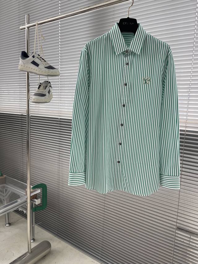 Louis Vuitton striped embroidered cotton poplin shirt with small details. Featu