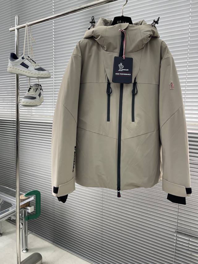 Mon Classic Ski Series Hooded Stand Collar Down Jacket. The classic three-dimens