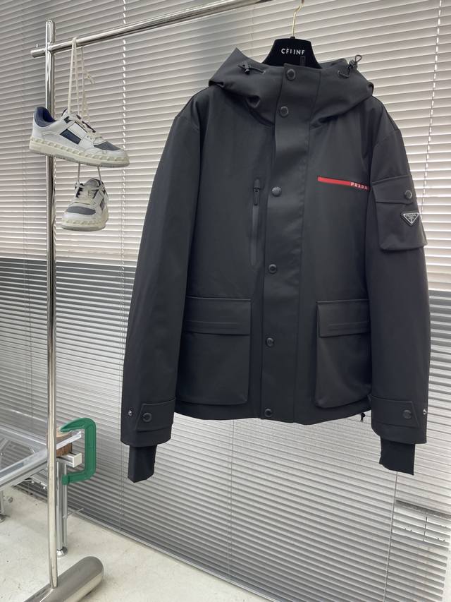 prad Men's Top-Tier Outdoor Waterproof Hooded Ski Jacket. This classic prad Line
