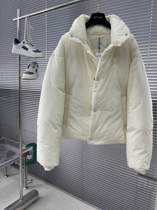 Ami Heart-Paced Embroidered Down Jacket is made of 100% polyester taffeta fabric