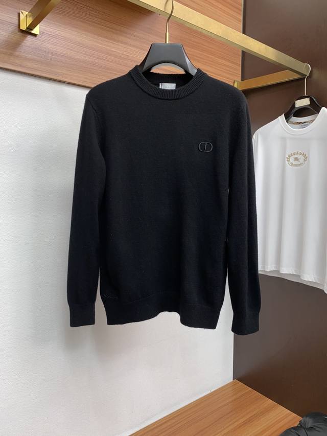 Dior Crew Neck Wool Sweater, woven with delicate fibers, exudes timeless elegan