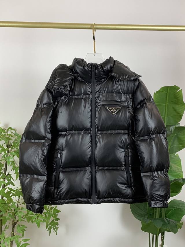 Prada's high-tech membrane down jacket features a different fabric than the tap