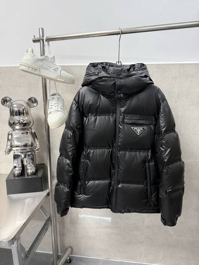 Prada Black Technology Leather Down Jacket This jacket uses a different fabric