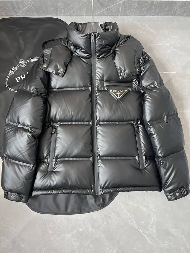 Prada high-tech heat-sealed down jacket. Detachable hood. Convertible stand-up