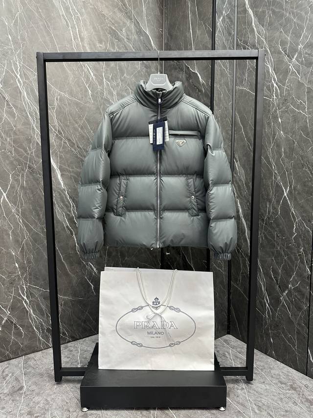 Premium Down Prada Tech Leather Down Jacket (Sealed Version). This jacket uses