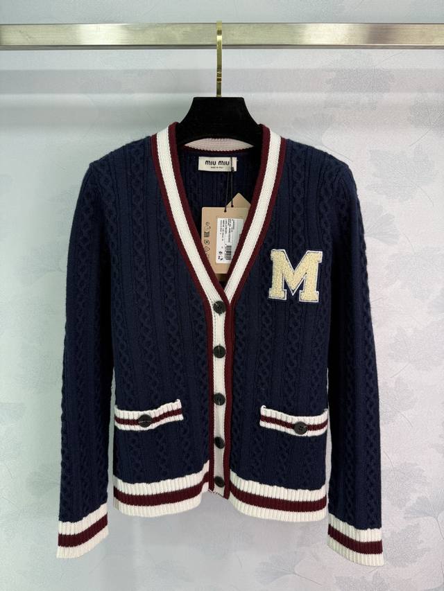Miu*25 Autumn/Winter New Preppy Style Knit Cardigan. Features a V-neck, single-b