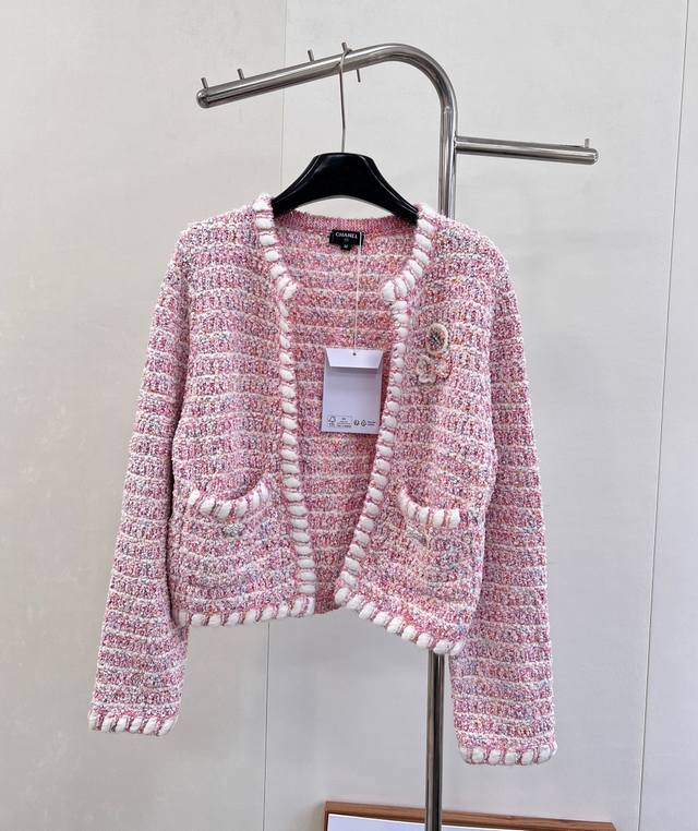 Chanel New Woven Knit Cardigan. When classic tweed meets soft pink tones, this C