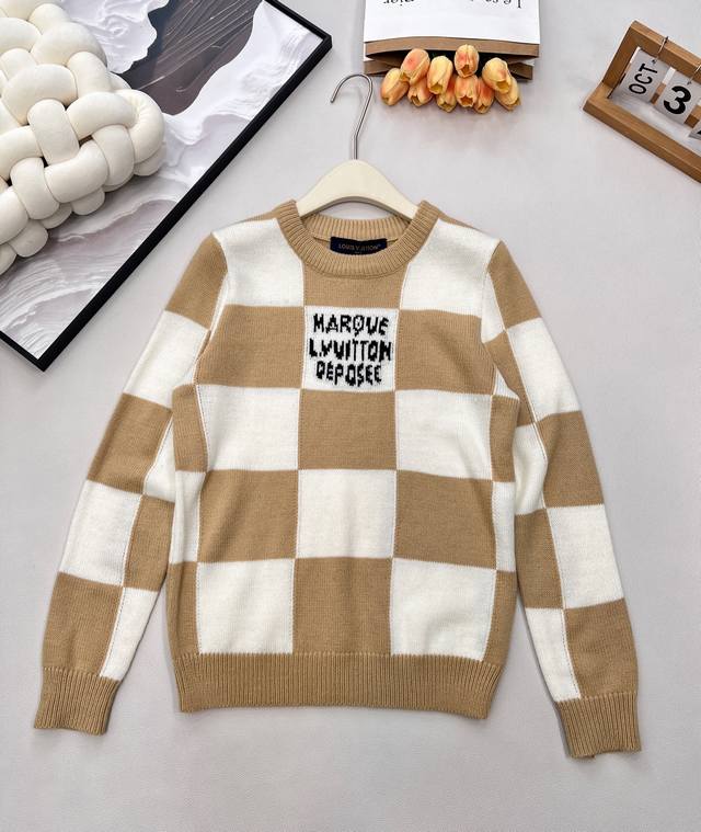 New Louis Vuitton checkered knit top. The unique color-blocked checkered patter