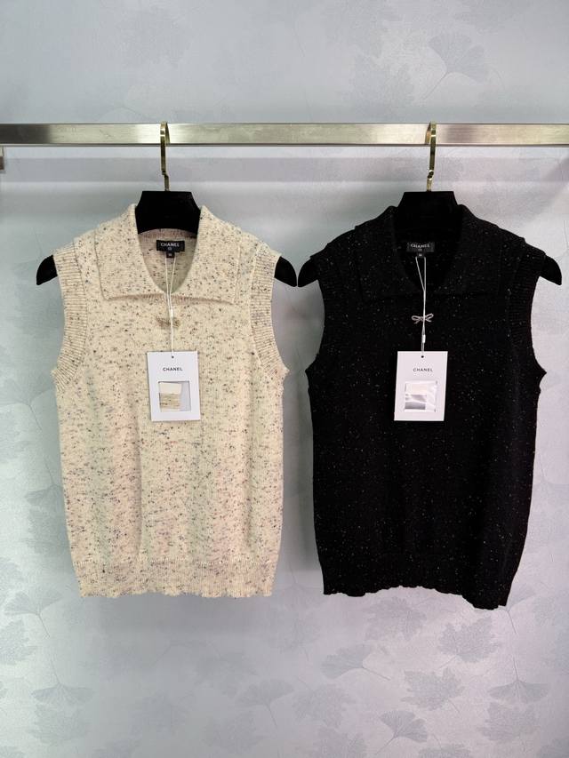 Ch**25N Ski Collection Knit Vest, black base with fine shimmering fibers, exudin