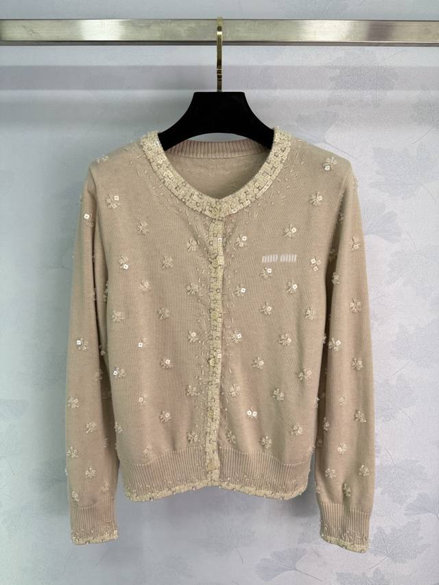 Miu*25 Autumn/Winter New Beaded Floral Knit Cardigan. The cardigan features a la