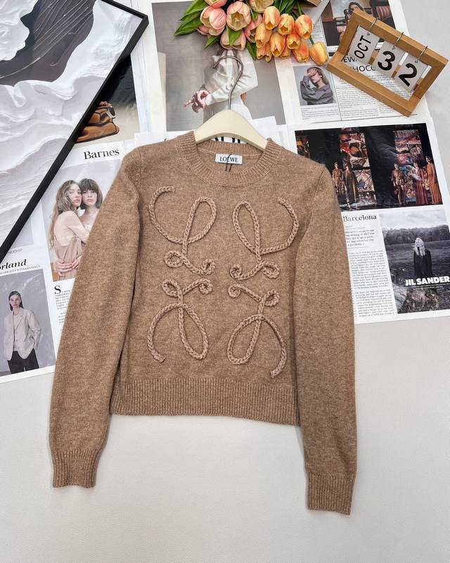 Loewe long-sleeved knit top with a large logo on the chest. Youthful, stylish, s