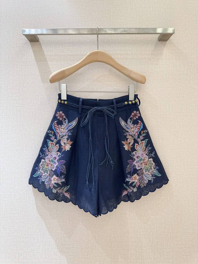 Zimmerma*N*N New Arrival Pleated Shorts These navy blue shorts feature a colorfu