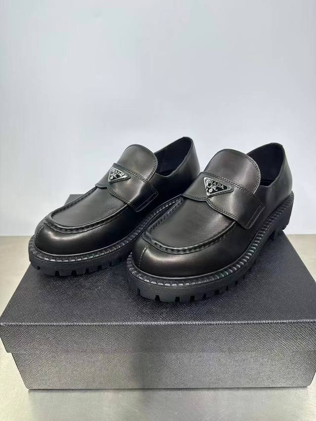 2025 Latest Prada Loafers with enamel metal triangle logo, leather design, sport
