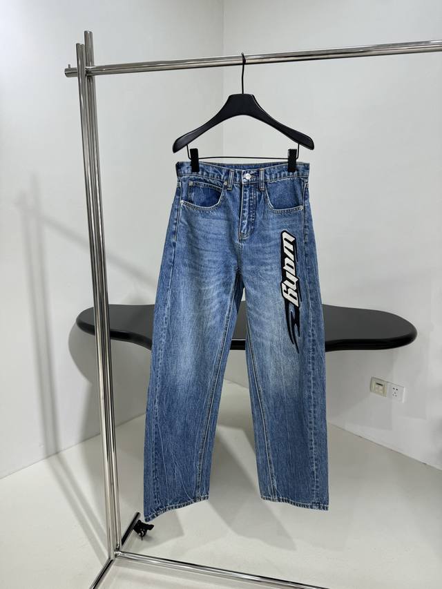 New Embroidered Logo Jeans Made of washed denim Featuring a distressed, creased