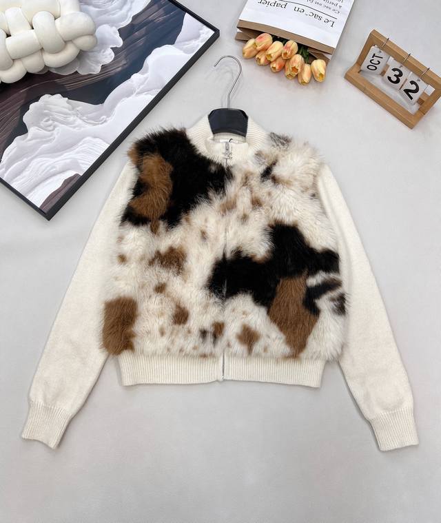 Celine's new shearling cardigan features a luxurious blend of fur and knit. The