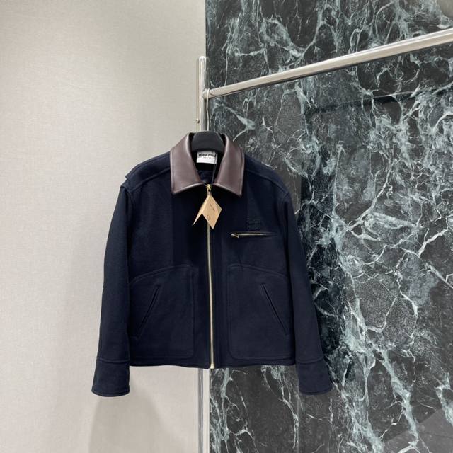 Miu Fall/Winter 2025 New Leather Collar Wool Jacket. The leather lapel creates a