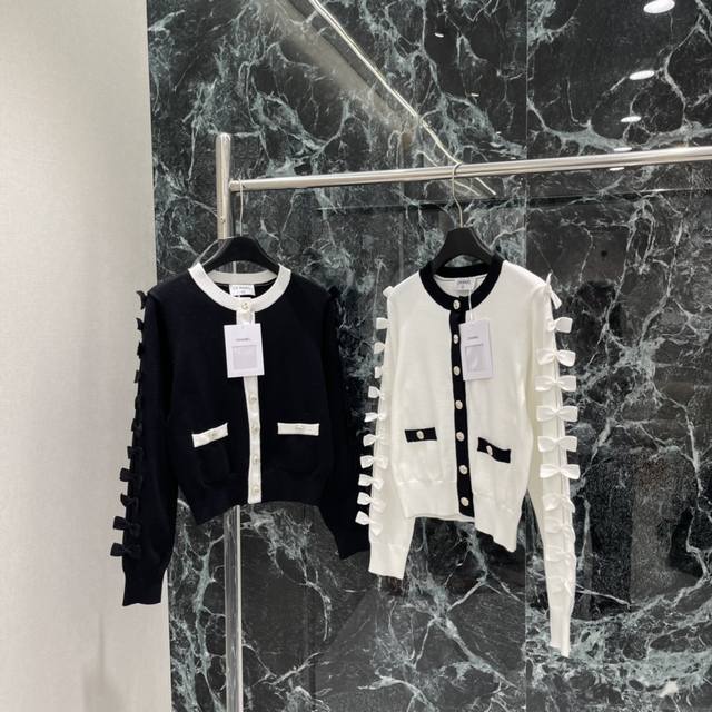 Chanel Fall/Winter 2025 New Bow-Knit Cardigan. The sleeves are adorned with bow