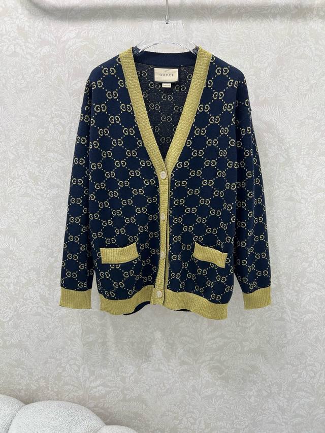 Gucc*25 New Knit Cardigan. Double G metallic fibers give the garment a dazzling,