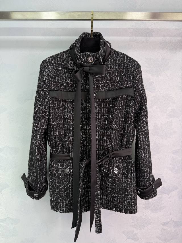 Ch*25Fw Woven belted dress coat with a distinct texture; the wool fabric is clea