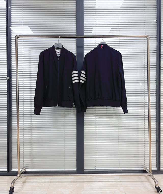 Jacket with Baseball Collar, Yarn-knitted Arms. Made of 100% Bassula wool, yarn