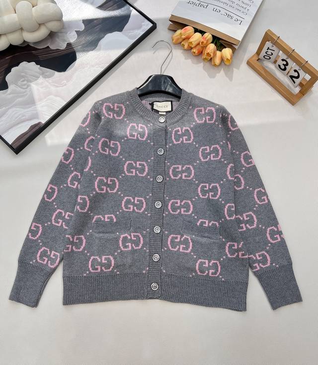 Gucci Color Block GG Jacquard Pink and Grey Wool Cardigan. The classic GG jacqua