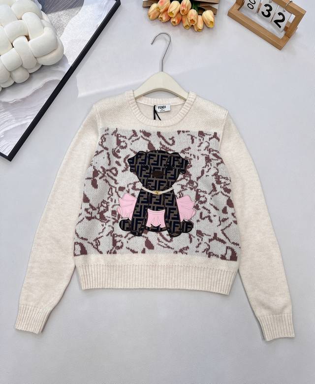Fendi's new long-sleeved knitwear with puppy applique embroidery. The classic g