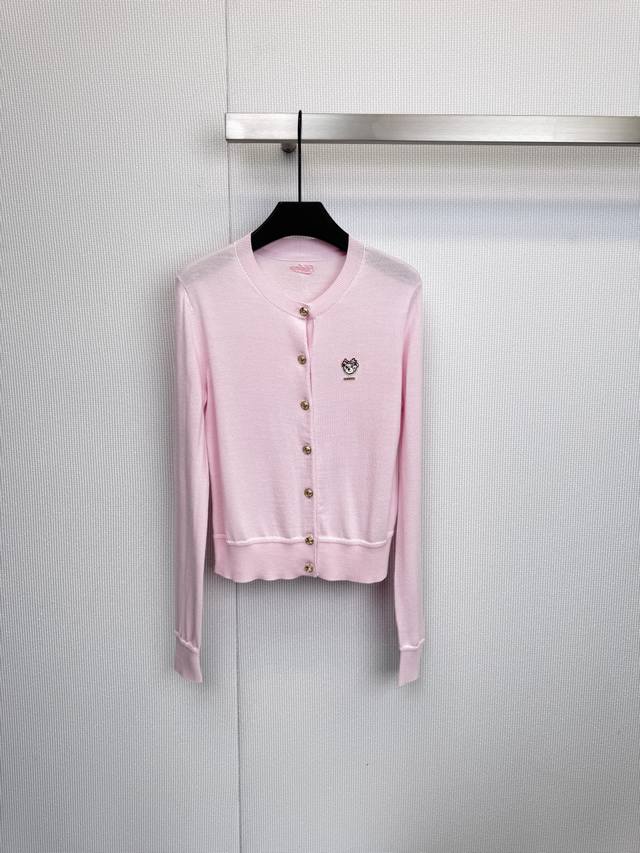 Soft and sweet, this Teenie Weenie pink cardigan is the epitome of gentleness.