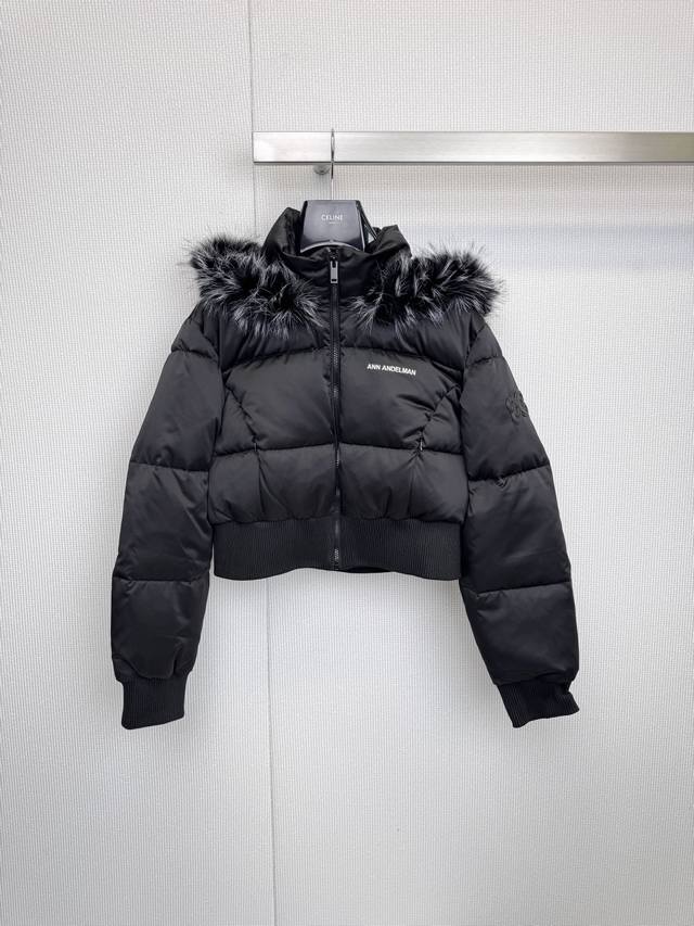 Capturing Winter Elegance: Ann Andelan Hooded Short Down Jacket. A dual-style c