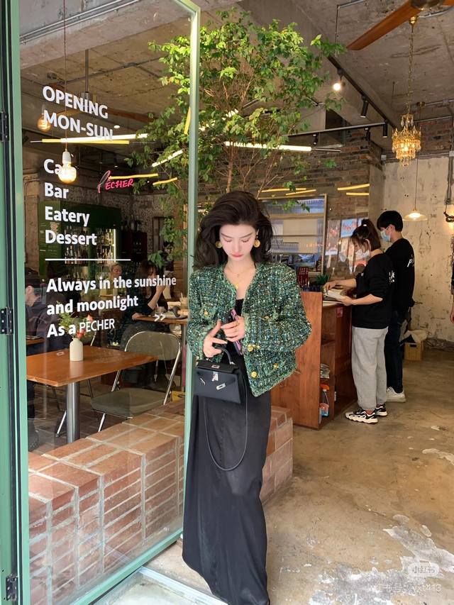 Chane* New high-end custom-made jacket with a metal chain stitched inside the he