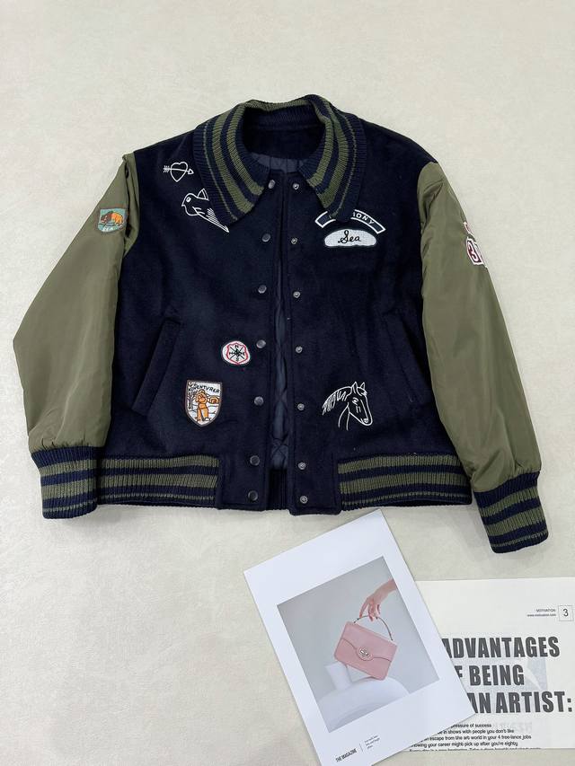 New Quilted Color-Blocked Embroidered Bomber Jacket... The clash of dark green