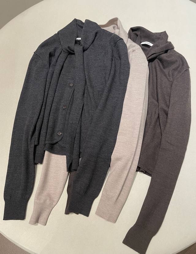 Sizes: S, M, L Lemaire Scarf Collar Microfiber Knit Cardigan The signature scar