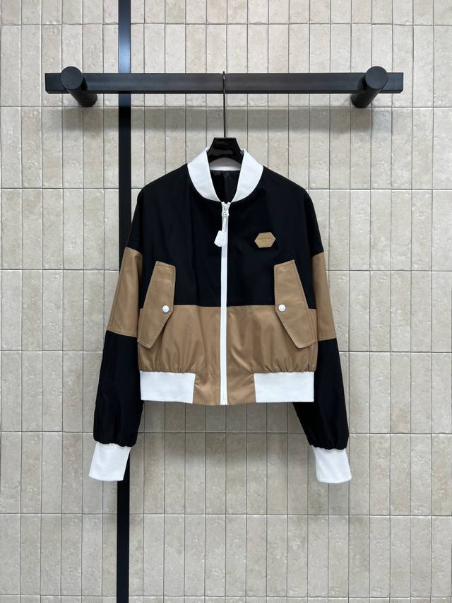 L's new Fall/Winter 2025 color-blocked bomber jacket: Black, brown, and white co