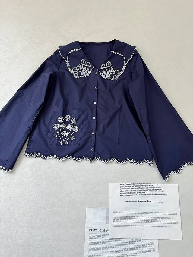 Today's style is French Sissel girl... Dark blue flared sleeve blouse with embr