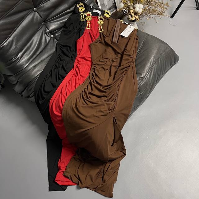 Schapareli 2025 New Dress The fitted, pleated style perfectly accentuates the fi