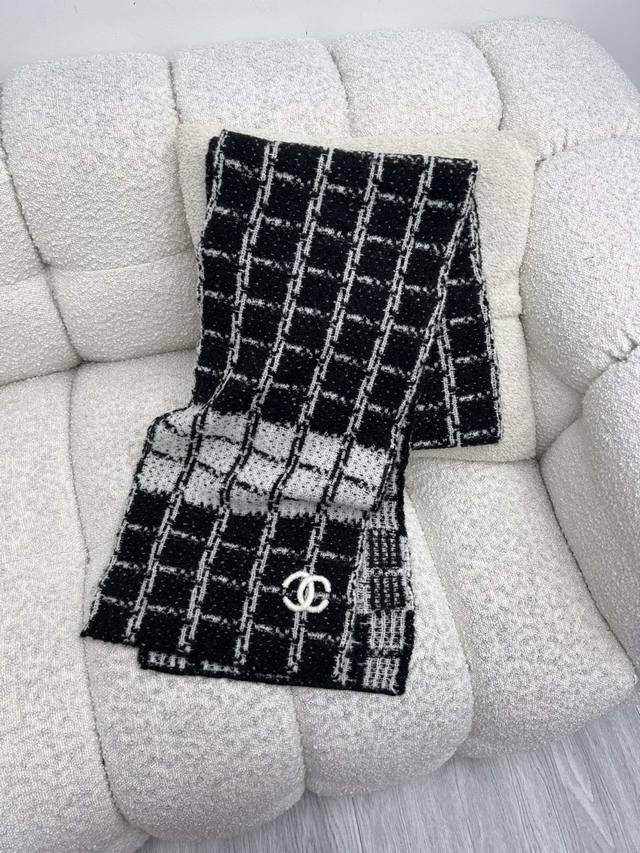 Chane* Cashmere Plaid Scarf Made of cashmere, wool, and silk The contrasting ret