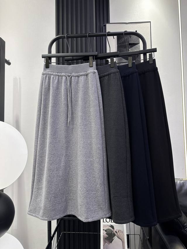 As - New style long skirt with a center back slit and fleece lining. The fabric