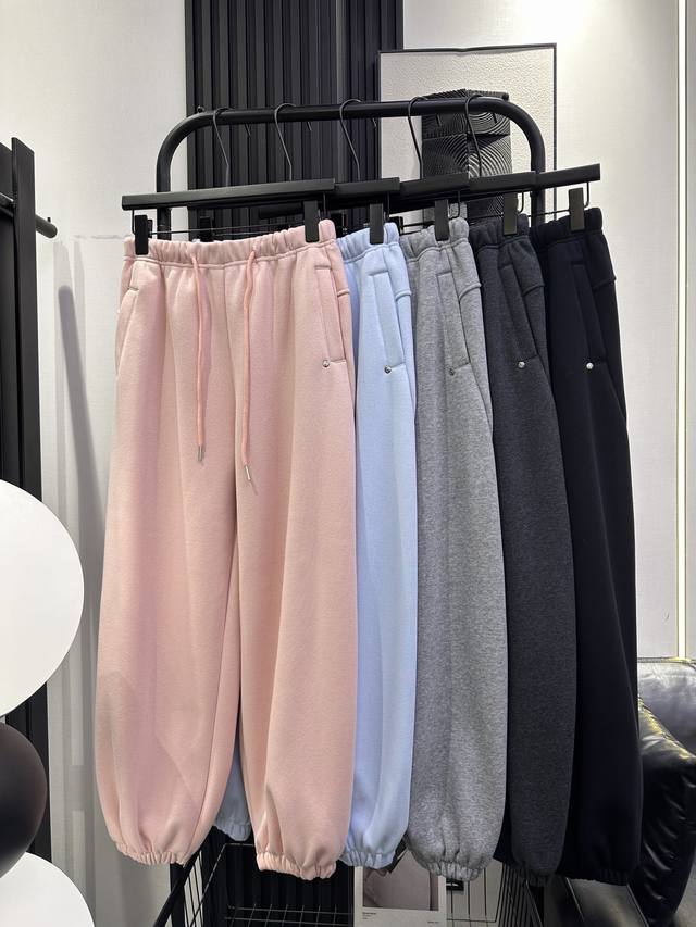 Balenciaga new style fleece-lined sweatpants with small round studs on the left