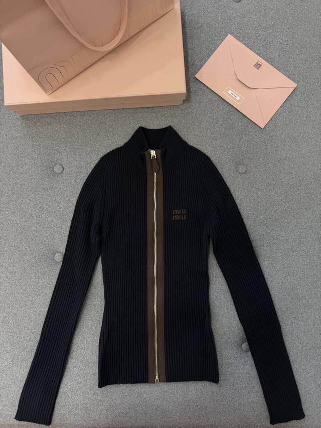 New Arrival Miu Miu Ribbed Knit Cashmere Blend Polo Shirt Miu Miu, known for its