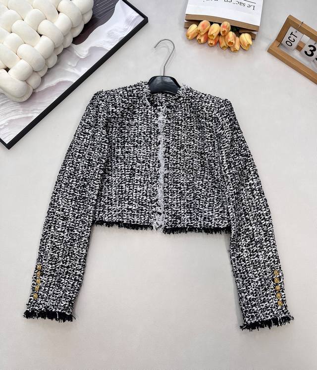 Balmain's new chunky wool blazer features a beautifully textured, high-end feel