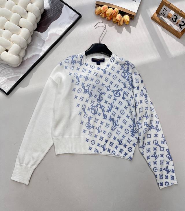 Louis Vuitton's new crew neck knit pullover features an irregular color-blocked