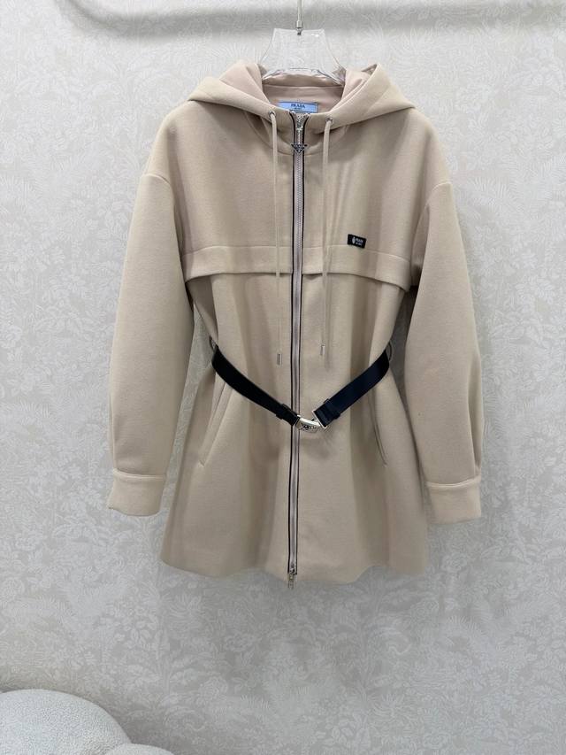 prad*25 New Hooded Belted Wool Coat. Custom triangular logo zipper on the collar