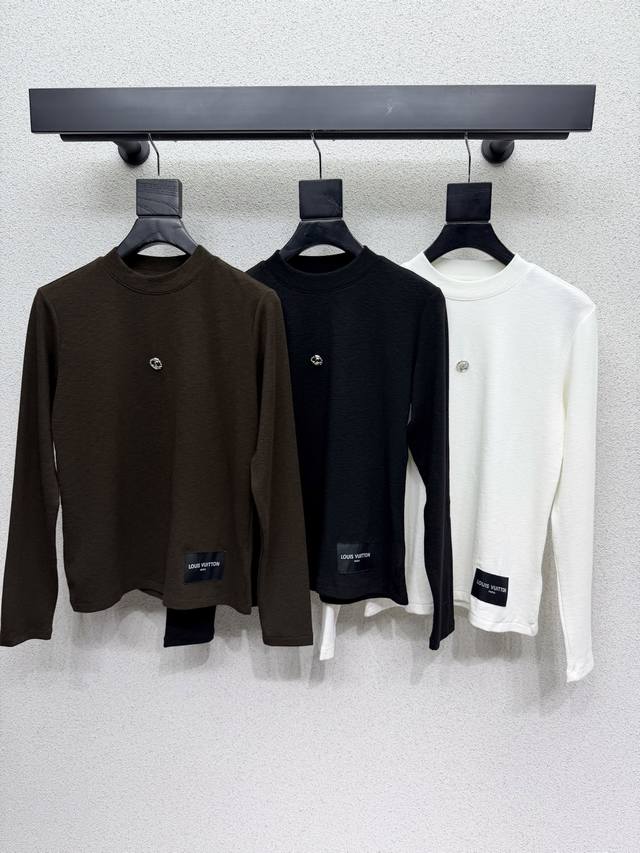 L's metallic logo base layer top looks amazing worn alone or layered under a jac