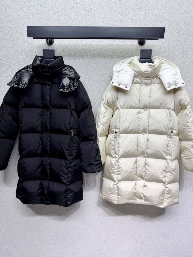 Moncler mid-length hooded down jacket with excellent overall warmth. Regular st