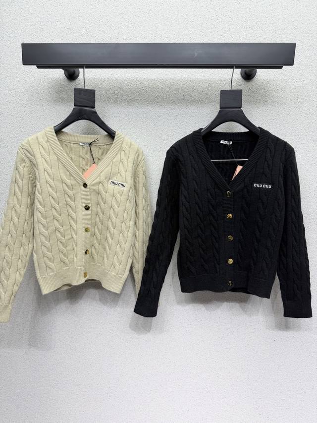 Miu's knitted wool cardigan top boasts a delicate and soft texture, a classic an